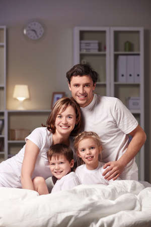 Families with children in the evening at homeの写真素材