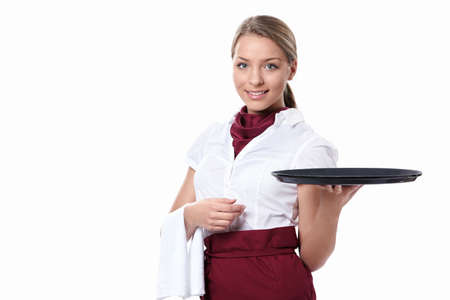 A young waitress with a tray on a white backgroundの写真素材