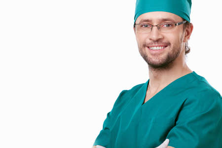 Portrait of a senior surgeon on white backgroundの写真素材