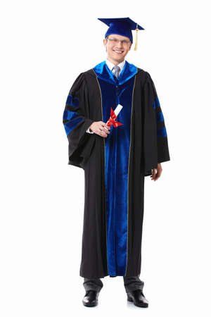 A young attractive student at the gown on a white backgroundの写真素材