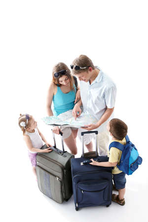 Family looking map on a white backgroundの写真素材