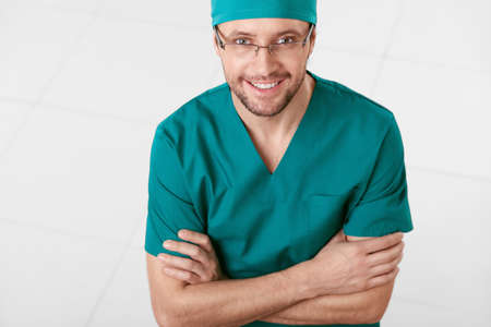 Portrait of a surgeon on white backgroundの写真素材