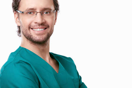 Smiling doctor with a white backgroundの写真素材
