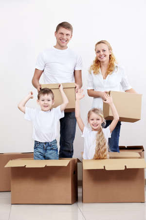 Families with children jumped out of cardboard boxesの写真素材