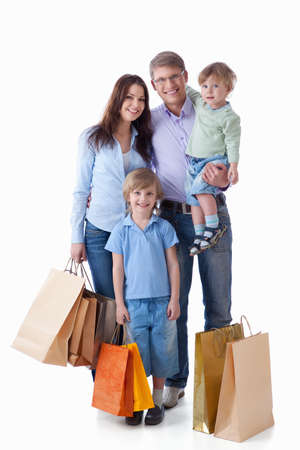 Family with shopping on white backgroundの写真素材