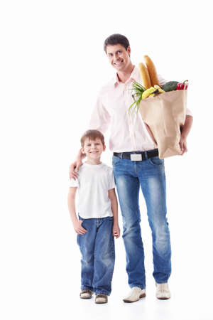 Dad and son with their purchases on a white backgroundの写真素材