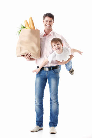 A father holding his son and the food package is isolatedの写真素材