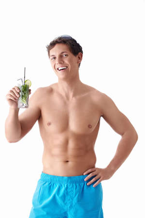 An attractive young man with a mojito on a white backgroundの写真素材