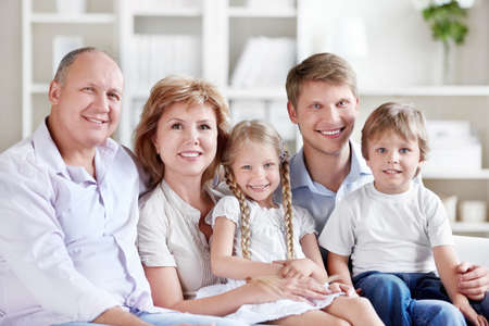 A large family with children at homeの写真素材