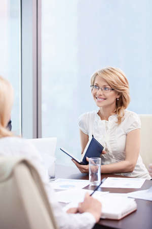 Mature attractive woman in the officeの写真素材