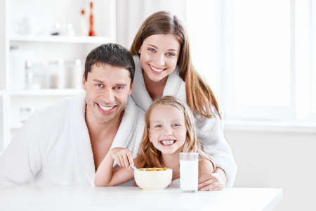 Happy family in the kitchenの写真素材