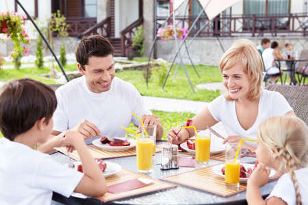 A happy family for a mealの写真素材