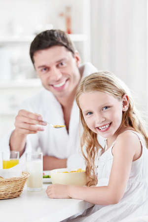 Father and child in the kitchenの写真素材