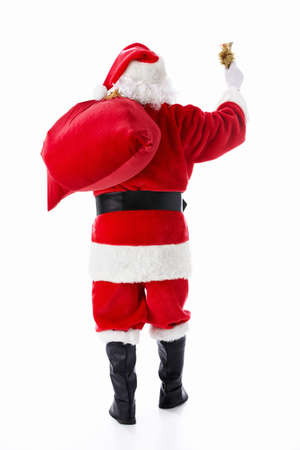 Santa Claus with a sack and a bell isolatedの写真素材