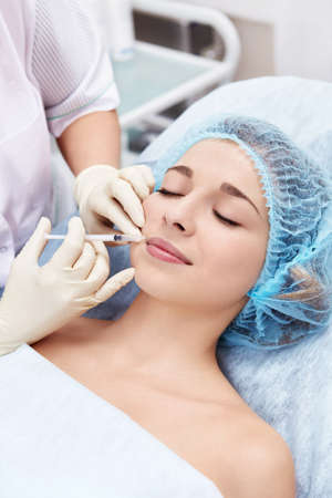 Inject Botox beautiful girlの写真素材