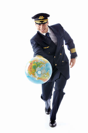 A man dressed as a pilot with a globe on a white backgroundの写真素材