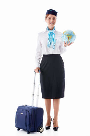 Stewardess with a suitcase and globe on white backgroundの写真素材