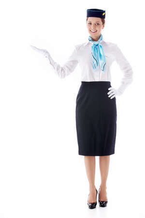 A young stewardess on a white backgroundの写真素材