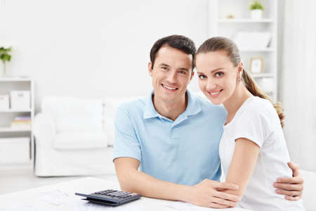 An attractive young couple at homeの写真素材