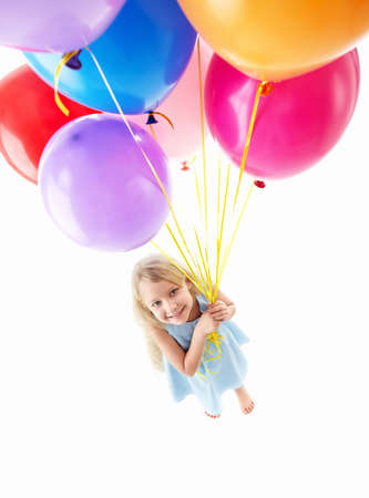 Little girl with balloonsの写真素材