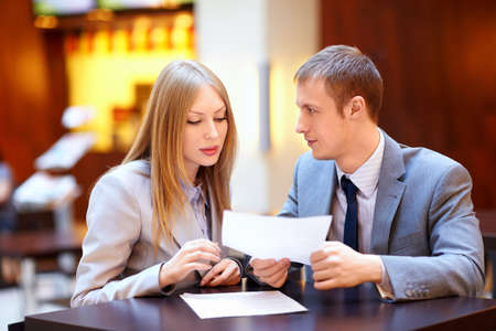 Man and woman in office