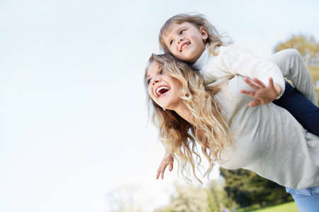 Mother and daughter outdoorsの写真素材