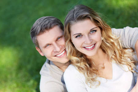 Happy young couple outdoorsの写真素材