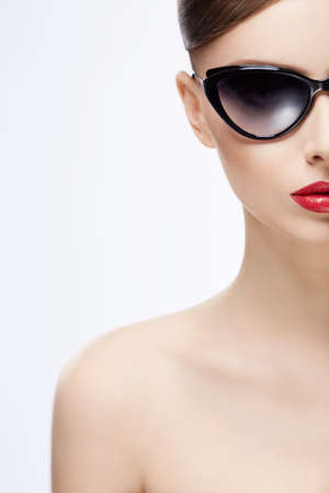Portrait of a young girl in sunglassesの写真素材