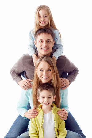 Happy family with children on a white backgroundの写真素材