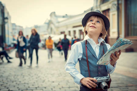 Tourist with map on the streetの写真素材