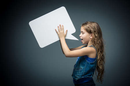 Little girl speaks in bubblesの写真素材