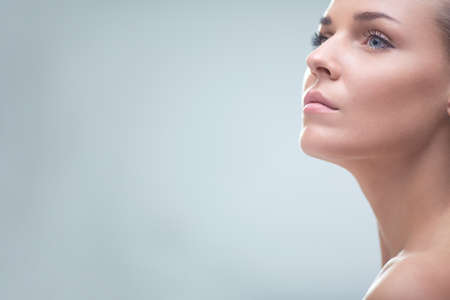 Young beautiful girl in studioの写真素材