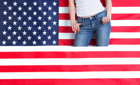 Part of a woman's body with American flagの写真素材