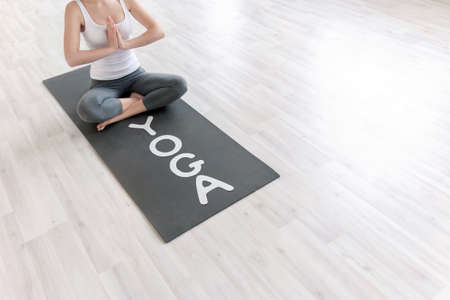 Young girl with the words Yogaの写真素材