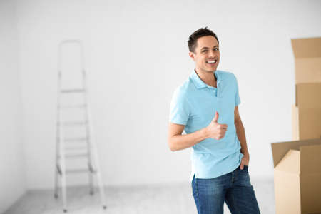 Young man with boxesの写真素材