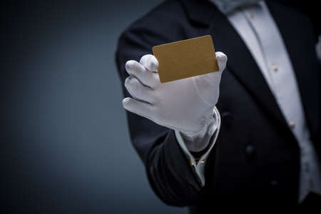 Man in a tuxedo with credit cardの写真素材