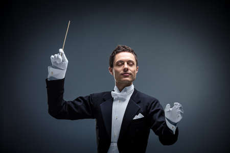 Conductor on a dark backgroundの写真素材