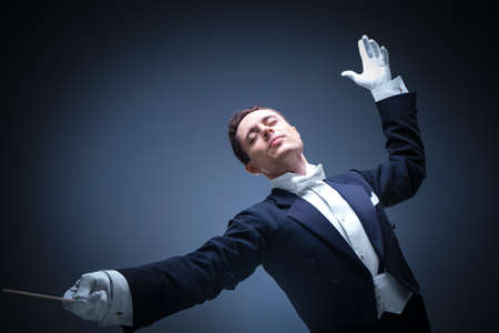 Conductor on a dark background