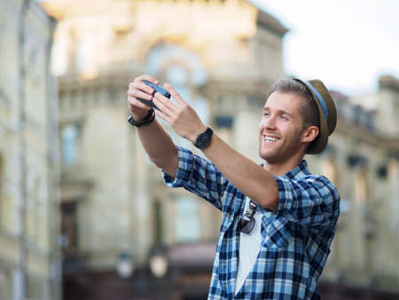Young man making selfie