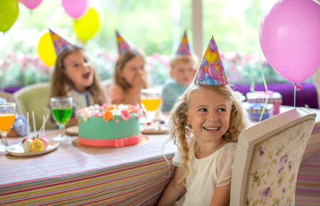 Birthday girl at a birthday partyの写真素材