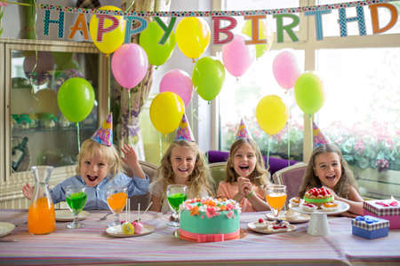 Little children at a birthday partyの写真素材