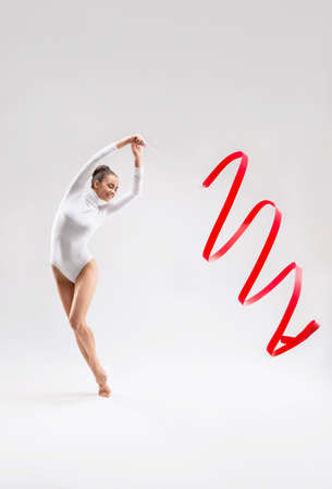 Young girl with tape in the studioの写真素材