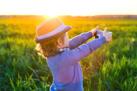 Little boy makes selfie outdoorsの写真素材