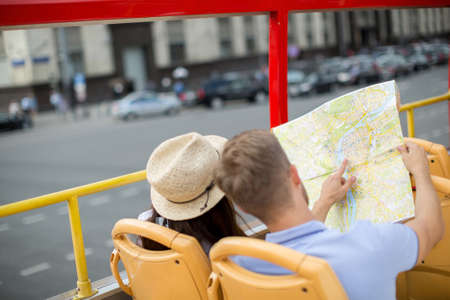 Young couple in a tour bus
