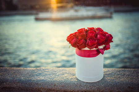 Red bouquet of flowers outdoorsの写真素材