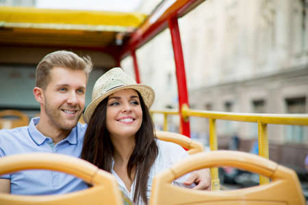 Young couple in the tour busの写真素材