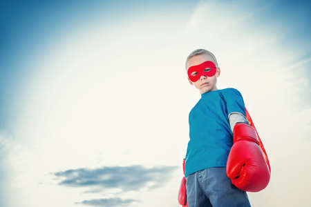 Little boy with boxing glovesの写真素材