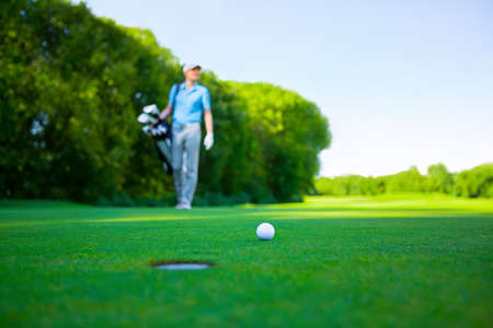 Golfer on the lawnの写真素材