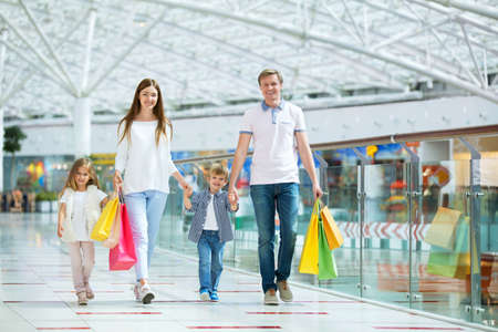 Families with a children in a storeの写真素材