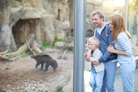 Family with child in zooの写真素材